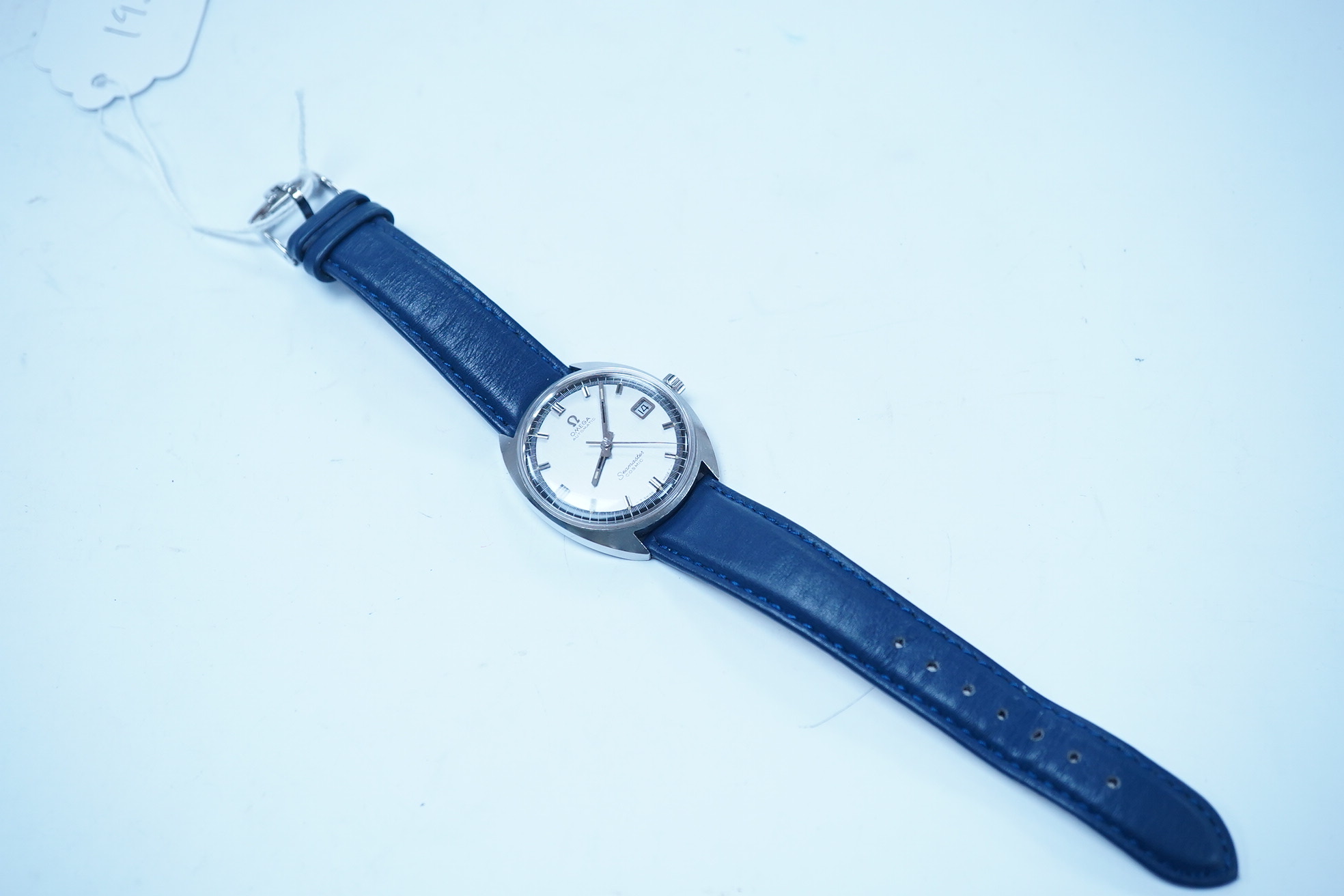 A gentleman's stainless steel Omega Seamaster Cosmic Automatic wrist watch, with baton numerals and date aperture, case diameter 35mm, on a later associated leather strap. Condition - fair